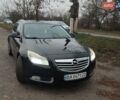 Черный Опель Инсигния, объемом двигателя 2 л и пробегом 265 тыс. км за 5750 $, фото 3 на Automoto.ua