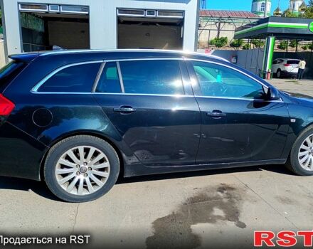 Черный Опель Инсигния, объемом двигателя 2 л и пробегом 322 тыс. км за 7500 $, фото 2 на Automoto.ua