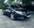 Черный Опель Инсигния, объемом двигателя 1.96 л и пробегом 200 тыс. км за 6100 $, фото 1 на Automoto.ua