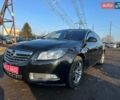 Чорний Опель Інсігнія, об'ємом двигуна 1.8 л та пробігом 242 тис. км за 6999 $, фото 1 на Automoto.ua