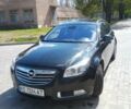 Чорний Опель Інсігнія, об'ємом двигуна 2 л та пробігом 248 тис. км за 7400 $, фото 1 на Automoto.ua