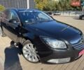 Черный Опель Инсигния, объемом двигателя 2 л и пробегом 237 тыс. км за 9200 $, фото 1 на Automoto.ua