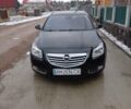 Черный Опель Инсигния, объемом двигателя 2 л и пробегом 217 тыс. км за 8500 $, фото 1 на Automoto.ua