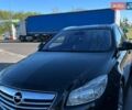 Чорний Опель Інсігнія, об'ємом двигуна 1.96 л та пробігом 237 тис. км за 7500 $, фото 1 на Automoto.ua