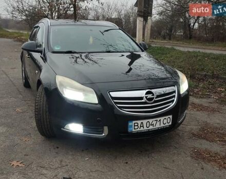 Черный Опель Инсигния, объемом двигателя 2 л и пробегом 265 тыс. км за 5750 $, фото 2 на Automoto.ua