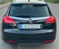 Черный Опель Инсигния, объемом двигателя 2 л и пробегом 395 тыс. км за 6123 $, фото 2 на Automoto.ua