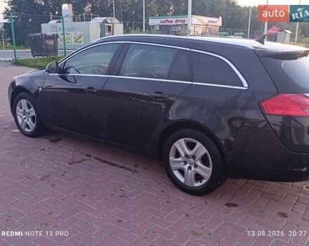 Чорний Опель Інсігнія, об'ємом двигуна 2 л та пробігом 242 тис. км за 6500 $, фото 2 на Automoto.ua