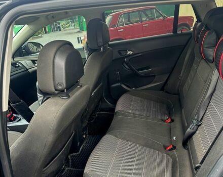 Черный Опель Инсигния, объемом двигателя 2 л и пробегом 296 тыс. км за 7000 $, фото 11 на Automoto.ua