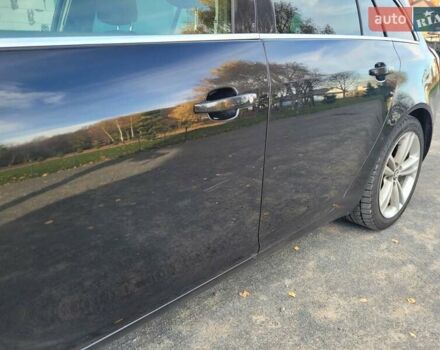 Чорний Опель Інсігнія, об'ємом двигуна 1.96 л та пробігом 225 тис. км за 7500 $, фото 8 на Automoto.ua