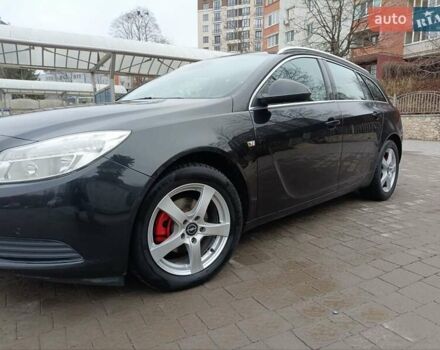 Чорний Опель Інсігнія, об'ємом двигуна 1.96 л та пробігом 179 тис. км за 6399 $, фото 9 на Automoto.ua