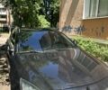 Чорний Опель Інсігнія, об'ємом двигуна 2 л та пробігом 249 тис. км за 7600 $, фото 1 на Automoto.ua
