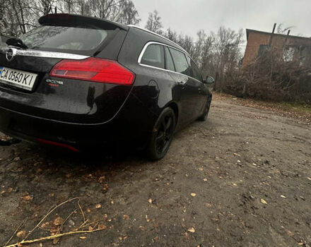 Чорний Опель Інсігнія, об'ємом двигуна 1.96 л та пробігом 288 тис. км за 6000 $, фото 7 на Automoto.ua