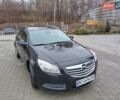 Чорний Опель Інсігнія, об'ємом двигуна 1.96 л та пробігом 179 тис. км за 6399 $, фото 7 на Automoto.ua