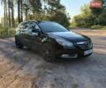 Чорний Опель Інсігнія, об'ємом двигуна 1.96 л та пробігом 325 тис. км за 7999 $, фото 5 на Automoto.ua