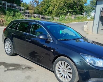 Чорний Опель Інсігнія, об'ємом двигуна 2 л та пробігом 323 тис. км за 7461 $, фото 2 на Automoto.ua