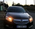 Черный Опель Инсигния, объемом двигателя 2 л и пробегом 327 тыс. км за 6950 $, фото 1 на Automoto.ua