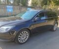Чорний Опель Інсігнія, об'ємом двигуна 2 л та пробігом 323 тис. км за 7461 $, фото 4 на Automoto.ua