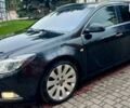 Чорний Опель Інсігнія, об'ємом двигуна 1.96 л та пробігом 400 тис. км за 6699 $, фото 10 на Automoto.ua