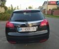 Черный Опель Инсигния, объемом двигателя 2 л и пробегом 327 тыс. км за 6950 $, фото 4 на Automoto.ua