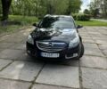 Черный Опель Инсигния, объемом двигателя 2 л и пробегом 269 тыс. км за 7600 $, фото 1 на Automoto.ua