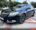 Чорний Опель Інсігнія, об'ємом двигуна 2 л та пробігом 250 тис. км за 5700 $, фото 1 на Automoto.ua