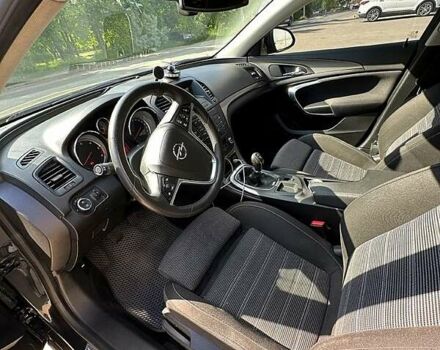 Чорний Опель Інсігнія, об'ємом двигуна 2 л та пробігом 296 тис. км за 7000 $, фото 6 на Automoto.ua