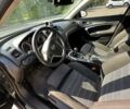 Чорний Опель Інсігнія, об'ємом двигуна 2 л та пробігом 296 тис. км за 7000 $, фото 6 на Automoto.ua