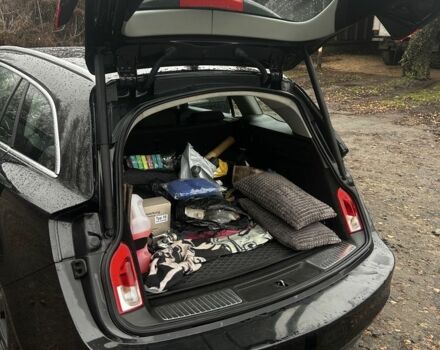 Чорний Опель Інсігнія, об'ємом двигуна 2 л та пробігом 288 тис. км за 6000 $, фото 4 на Automoto.ua