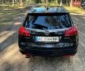 Чорний Опель Інсігнія, об'ємом двигуна 2 л та пробігом 325 тис. км за 6500 $, фото 8 на Automoto.ua