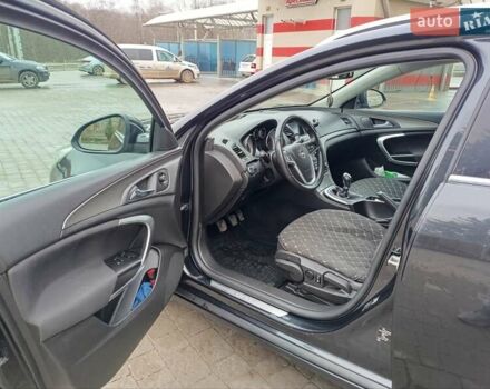 Чорний Опель Інсігнія, об'ємом двигуна 1.96 л та пробігом 179 тис. км за 6399 $, фото 10 на Automoto.ua