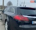 Чорний Опель Інсігнія, об'ємом двигуна 1.96 л та пробігом 260 тис. км за 5999 $, фото 4 на Automoto.ua
