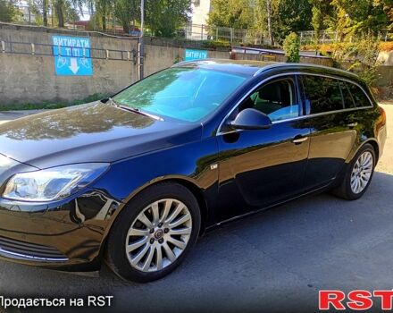 Черный Опель Инсигния, объемом двигателя 2 л и пробегом 322 тыс. км за 7500 $, фото 3 на Automoto.ua