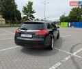 Черный Опель Инсигния, объемом двигателя 1.96 л и пробегом 223 тыс. км за 7200 $, фото 1 на Automoto.ua
