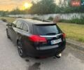 Чорний Опель Інсігнія, об'ємом двигуна 1.96 л та пробігом 320 тис. км за 6900 $, фото 3 на Automoto.ua