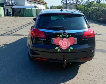 Чорний Опель Інсігнія, об'ємом двигуна 2 л та пробігом 323 тис. км за 7461 $, фото 1 на Automoto.ua