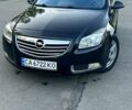 Черный Опель Инсигния, объемом двигателя 2 л и пробегом 395 тыс. км за 7300 $, фото 1 на Automoto.ua