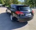 Чорний Опель Інсігнія, об'ємом двигуна 2 л та пробігом 219 тис. км за 6524 $, фото 5 на Automoto.ua
