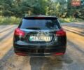 Чорний Опель Інсігнія, об'ємом двигуна 1.96 л та пробігом 325 тис. км за 7999 $, фото 6 на Automoto.ua