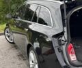 Чорний Опель Інсігнія, об'ємом двигуна 2 л та пробігом 325 тис. км за 6500 $, фото 4 на Automoto.ua