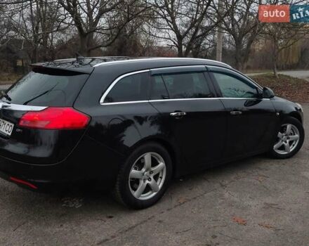 Черный Опель Инсигния, объемом двигателя 2 л и пробегом 265 тыс. км за 5750 $, фото 6 на Automoto.ua
