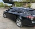 Черный Опель Инсигния, объемом двигателя 2 л и пробегом 240 тыс. км за 6999 $, фото 4 на Automoto.ua