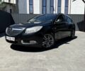 Чорний Опель Інсігнія, об'ємом двигуна 2 л та пробігом 251 тис. км за 8000 $, фото 1 на Automoto.ua