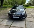 Черный Опель Инсигния, объемом двигателя 2 л и пробегом 269 тыс. км за 7600 $, фото 1 на Automoto.ua