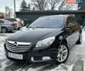 Чорний Опель Інсігнія, об'ємом двигуна 2 л та пробігом 320 тис. км за 6500 $, фото 1 на Automoto.ua