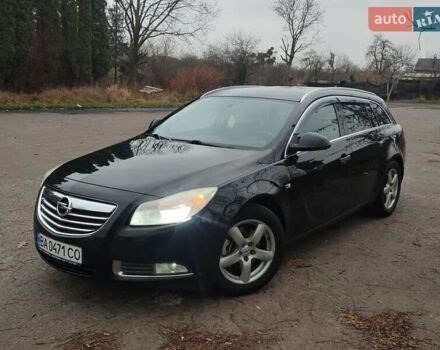 Черный Опель Инсигния, объемом двигателя 2 л и пробегом 265 тыс. км за 5750 $, фото 1 на Automoto.ua
