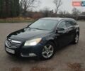 Черный Опель Инсигния, объемом двигателя 2 л и пробегом 265 тыс. км за 5750 $, фото 1 на Automoto.ua