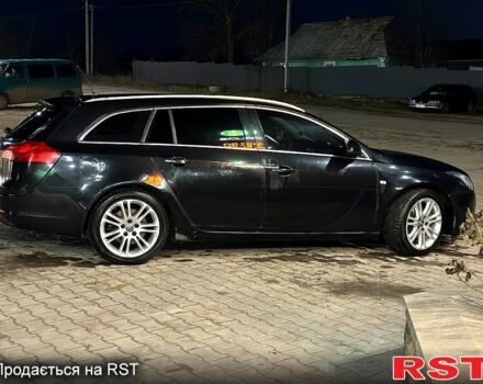 Черный Опель Инсигния, объемом двигателя 2 л и пробегом 296 тыс. км за 7000 $, фото 5 на Automoto.ua