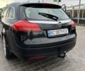 Чорний Опель Інсігнія, об'ємом двигуна 2 л та пробігом 330 тис. км за 6800 $, фото 2 на Automoto.ua