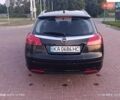 Чорний Опель Інсігнія, об'ємом двигуна 2 л та пробігом 242 тис. км за 6500 $, фото 5 на Automoto.ua