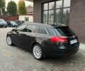 Чорний Опель Інсігнія, об'ємом двигуна 1.96 л та пробігом 336 тис. км за 7300 $, фото 1 на Automoto.ua